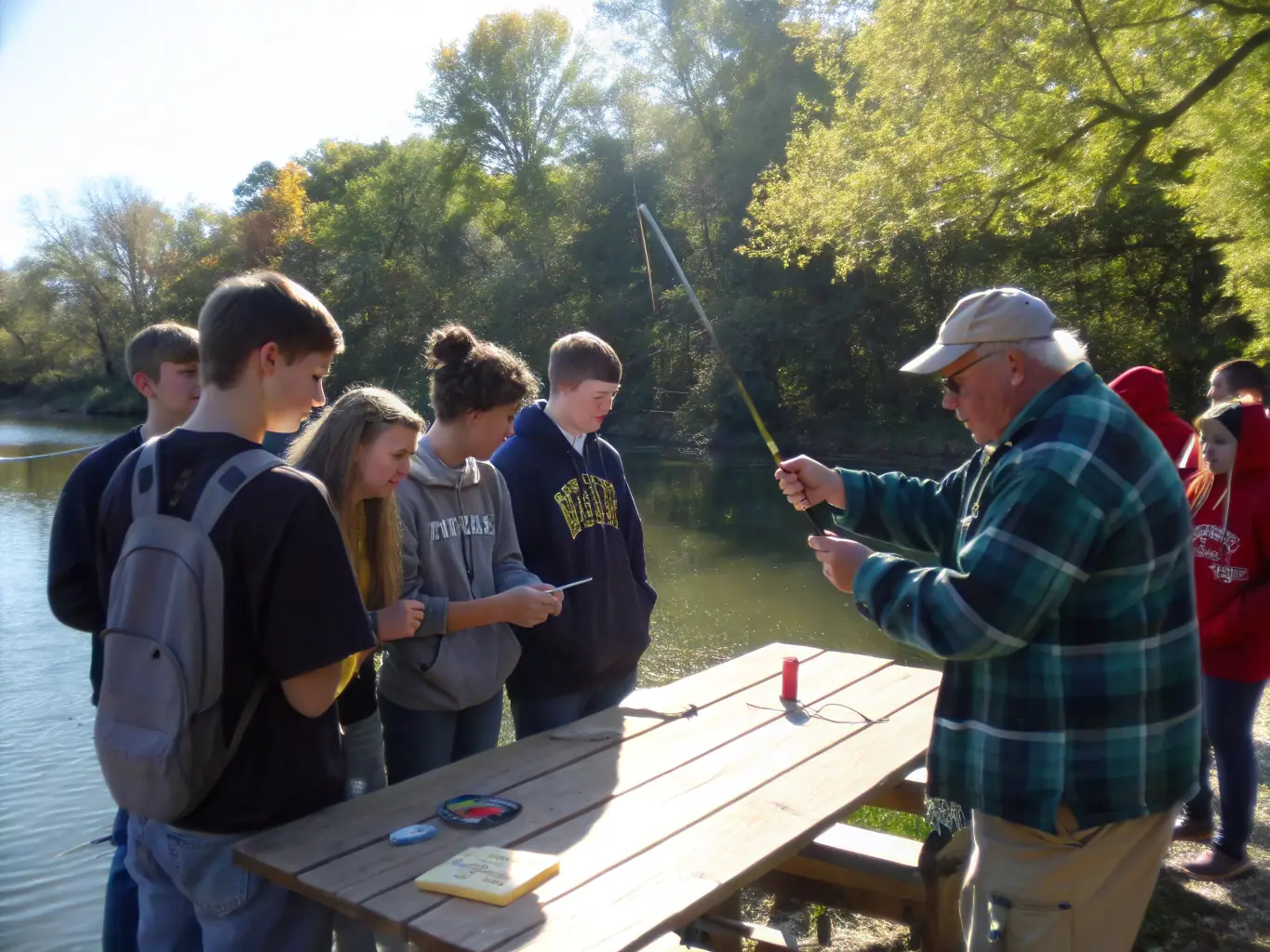 Participants attending an educational workshop on responsible fishing practices and aquatic ecology, learning from experienced instructors.